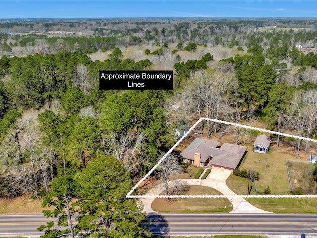 4662 Old Union Rd, Lufkin, TX 75904 - birds eye view of property featuring a view of trees