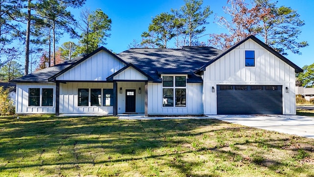 modern farmhouse style home featuring a garage and a front lawn