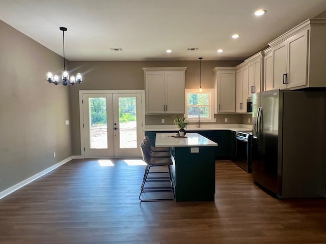 105 Cooper Rd, Zavalla, TX 75980 - kitchen with appliances with stainless steel finishes, a center island, dark wood-style floors, light countertops, and recessed lighting