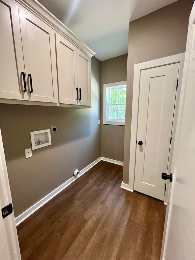 105 Cooper Rd, Zavalla, TX 75980 - laundry area featuring dark wood-style flooring, cabinet space, electric dryer hookup, and hookup for a washing machine