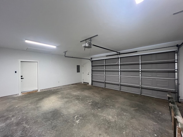 105 Cooper Rd, Zavalla, TX 75980 - garage featuring a garage door opener and electric panel