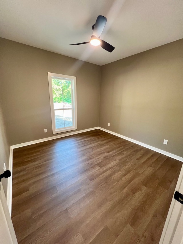 105 Cooper Rd, Zavalla, TX 75980 - spare room featuring a ceiling fan and dark wood finished floors