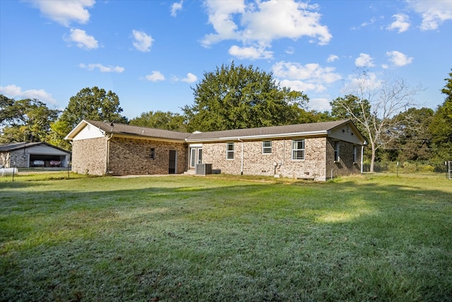 view of front of property featuring cooling unit and a front lawn