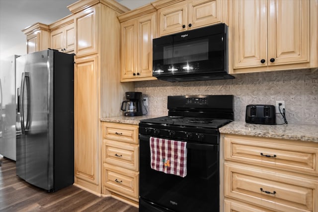 kitchen featuring light brown cabinets, black appliances, decorative backsplash, light stone counters, and dark hardwood / wood-style flooring