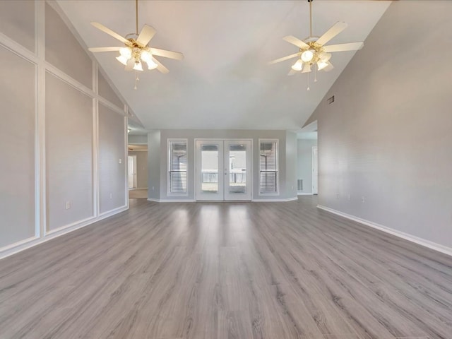 unfurnished living room with visible vents, french doors, light wood finished floors, and a ceiling fan