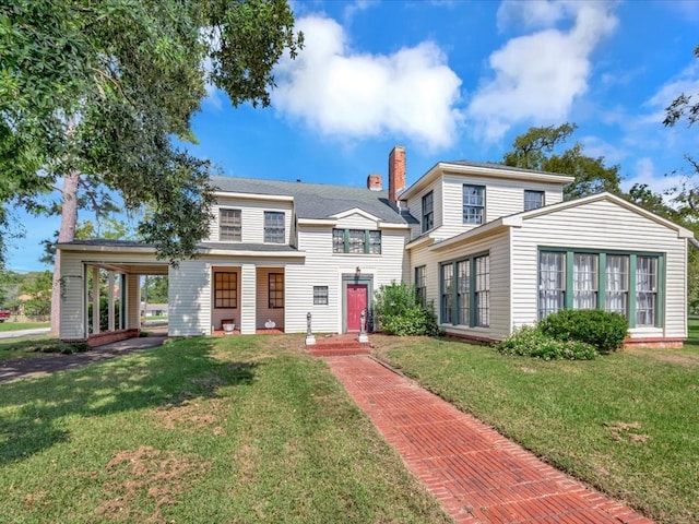 view of front facade with a front yard