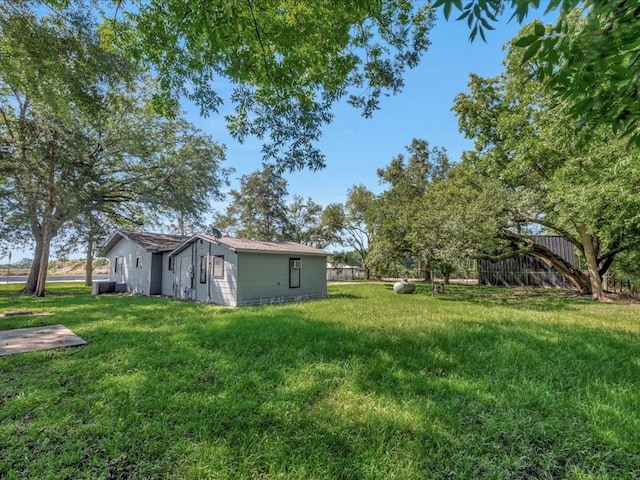 view of yard featuring central AC