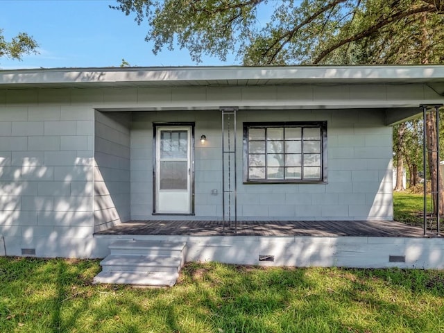 entrance to property with a porch