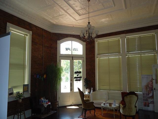 dining area with french doors and a chandelier