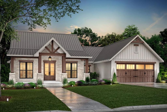 106 Evergreen Ln, Lufkin, TX 75904 - modern farmhouse style home with a standing seam roof, stone siding, a front yard, concrete driveway, and a garage