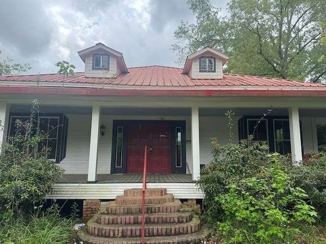 805 Worth St, Hemphill, TX 75948 - farmhouse inspired home with a porch and metal roof