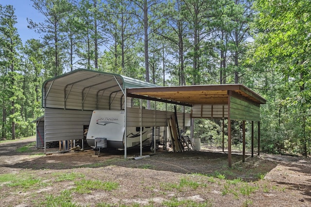 view of car parking featuring a carport