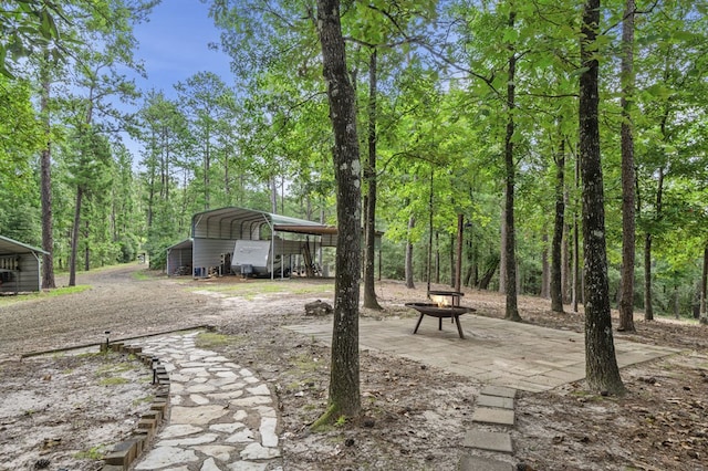 view of yard featuring a carport