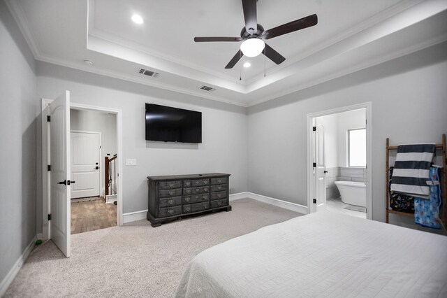 169 Shady Oaks Loop, Lufkin, TX 75904 - bedroom featuring carpet flooring, a tray ceiling, crown molding, recessed lighting, and connected bathroom