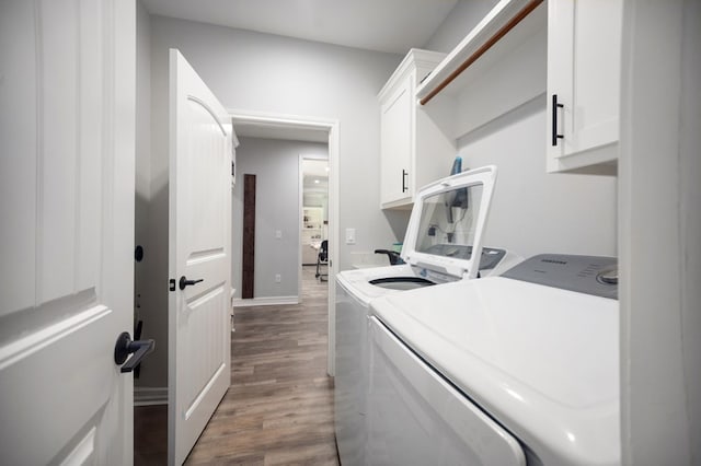 169 Shady Oaks Loop, Lufkin, TX 75904 - washroom with washer and dryer, cabinet space, and wood finished floors