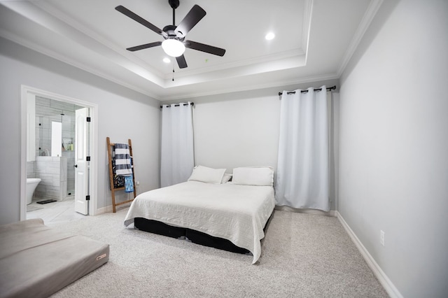 169 Shady Oaks Loop, Lufkin, TX 75904 - bedroom featuring crown molding, a raised ceiling, light carpet, ensuite bath, and ceiling fan