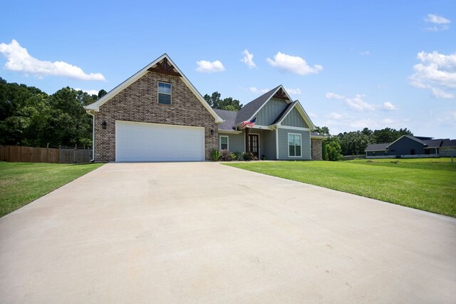 169 Shady Oaks Loop, Lufkin, TX 75904 - craftsman-style house featuring concrete driveway, brick siding, board and batten siding, and an attached garage