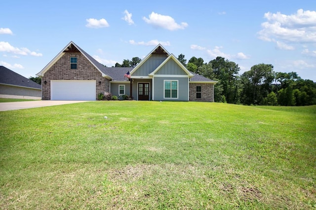 169 Shady Oaks Loop, Lufkin, TX 75904 - craftsman-style house featuring board and batten siding, a front lawn, driveway, a garage, and brick siding