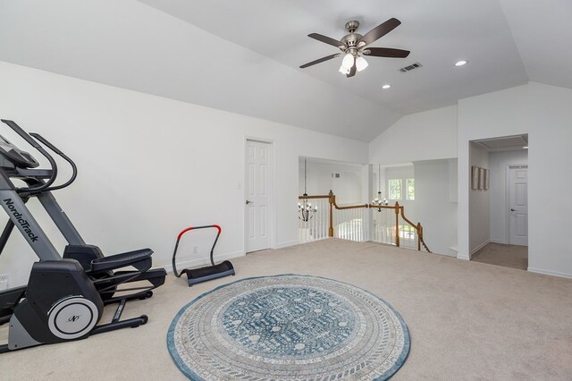 workout room with light carpet, vaulted ceiling, and ceiling fan