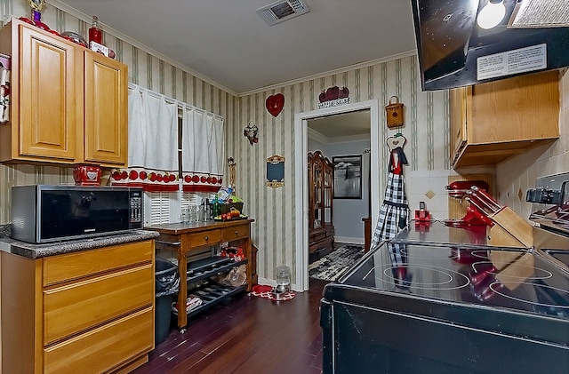 kitchen with crown molding, dark wood-type flooring, extractor fan, and stainless steel electric range