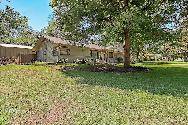 exterior space with a yard