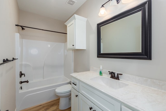 211 Rustic Pines Dr, Lufkin, TX 75904 - bathroom with vanity, wood finished floors, and bathing tub / shower combination