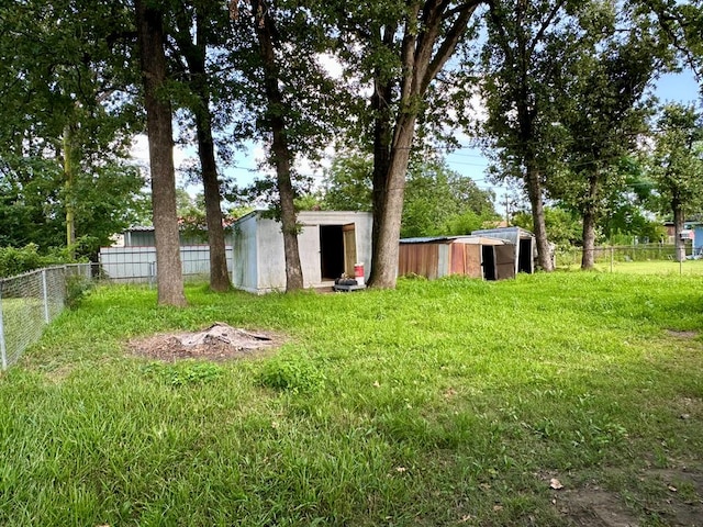 113 Butler St, Lufkin, TX 75904 - view of yard featuring a shed
