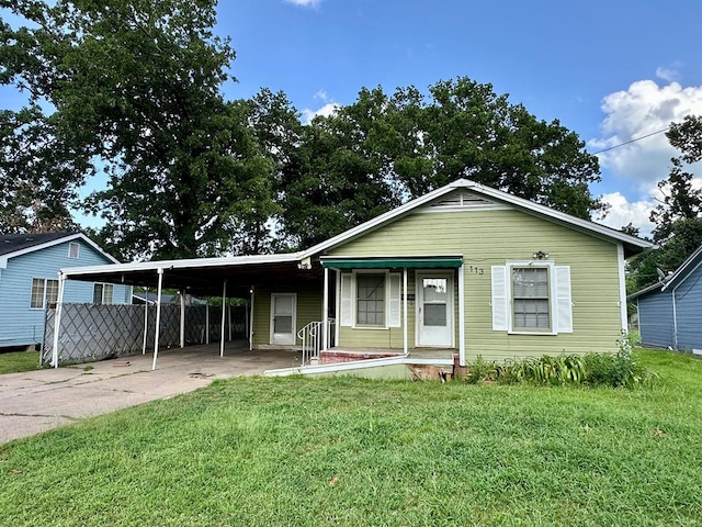 113 Butler St, Lufkin, TX 75904 - view of front of home featuring driveway and an attached carport