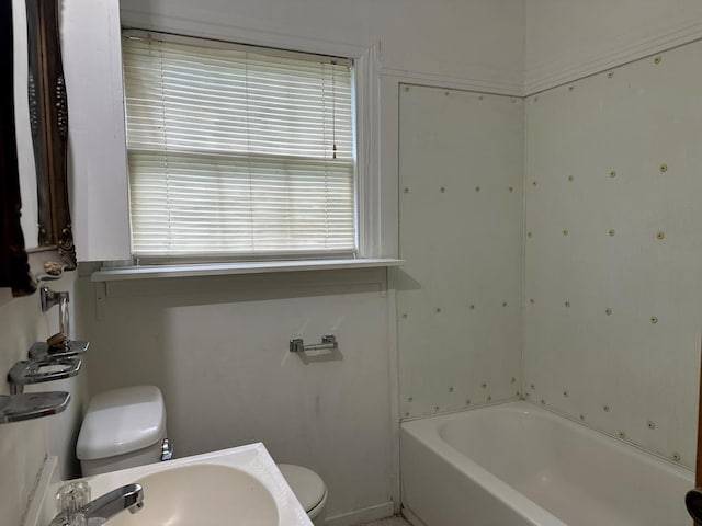 113 Butler St, Lufkin, TX 75904 - bathroom featuring toilet and a bathtub