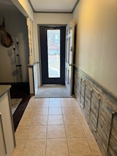 entryway featuring light tile patterned flooring