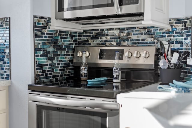 kitchen featuring decorative backsplash and stainless steel appliances