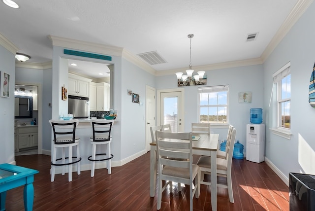 dining area with ornamental molding and dark wood-type flooring