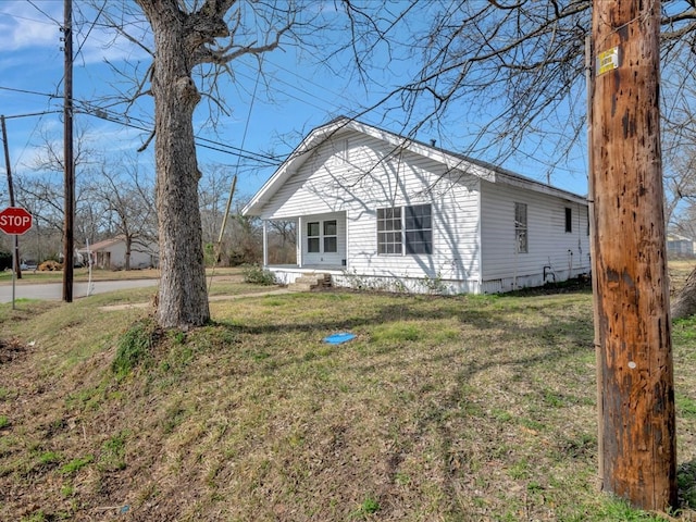 exterior space with a front yard