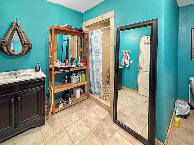 341 Red Wolf Ln, Brookeland, TX 75931 - full bath featuring a stall shower, vanity, and tile patterned flooring