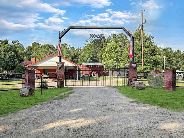 341 Red Wolf Ln, Brookeland, TX 75931 - view of gate