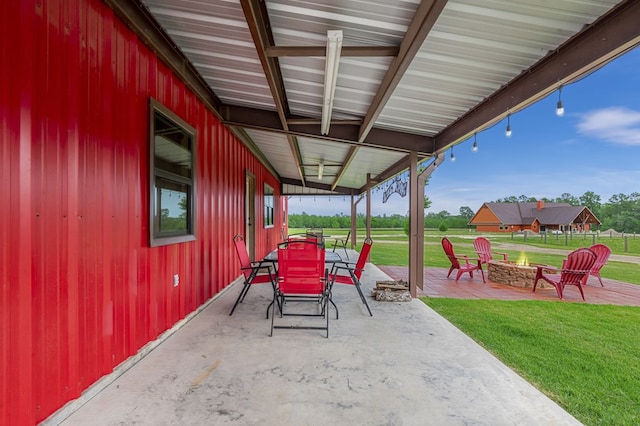 view of patio featuring an outdoor fire pit