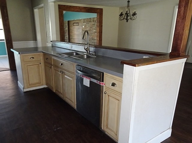 kitchen featuring sink, black dishwasher, dark hardwood / wood-style floors, a notable chandelier, and pendant lighting