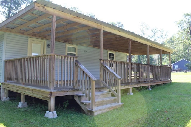 wooden deck with a lawn