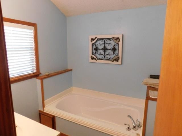 bathroom with a bath