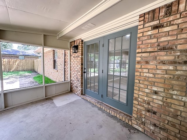 213 Crosstimbers St, Lufkin, TX 75904 - unfurnished sunroom featuring french doors