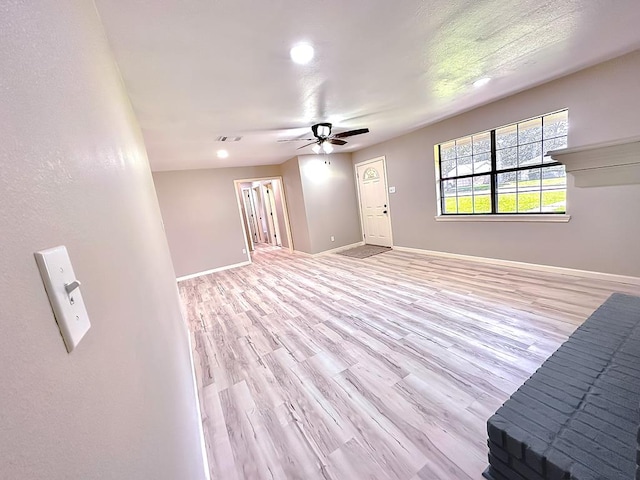 213 Crosstimbers St, Lufkin, TX 75904 - spare room featuring ceiling fan, light wood-style flooring, baseboards, and recessed lighting