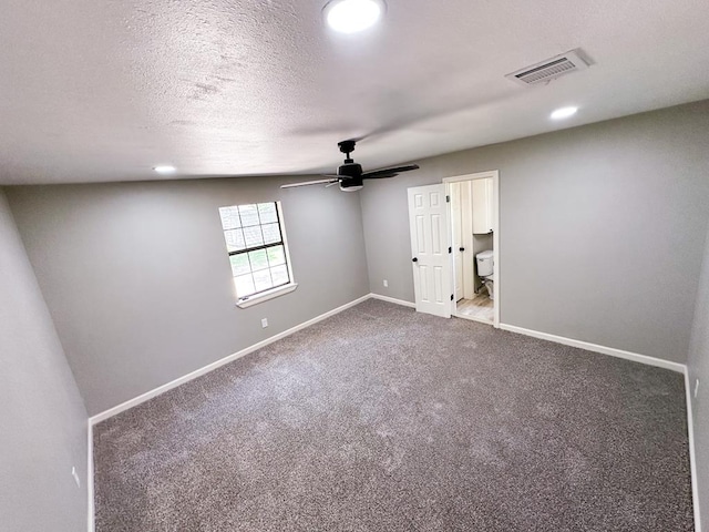 213 Crosstimbers St, Lufkin, TX 75904 - unfurnished bedroom featuring baseboards, carpet floors, ensuite bath, a ceiling fan, and recessed lighting