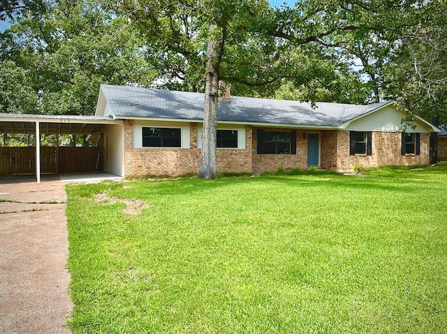 213 Crosstimbers St, Lufkin, TX 75904 - ranch-style house with a carport, brick siding, and concrete driveway