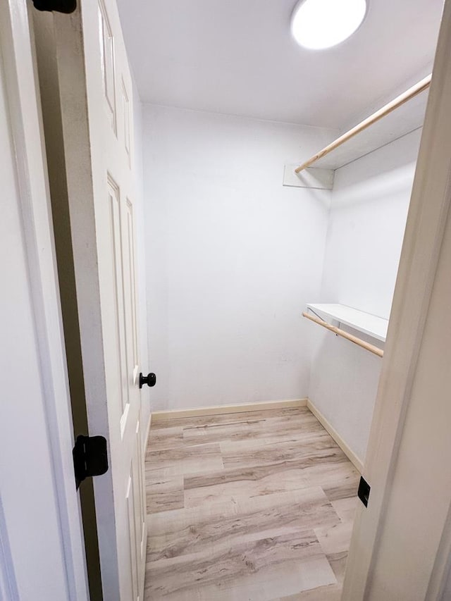 213 Crosstimbers St, Lufkin, TX 75904 - walk in closet with wood finished floors