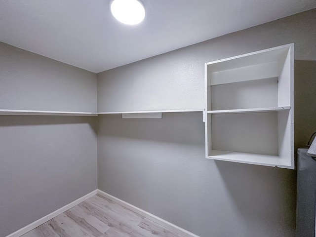 213 Crosstimbers St, Lufkin, TX 75904 - walk in closet featuring wood finished floors