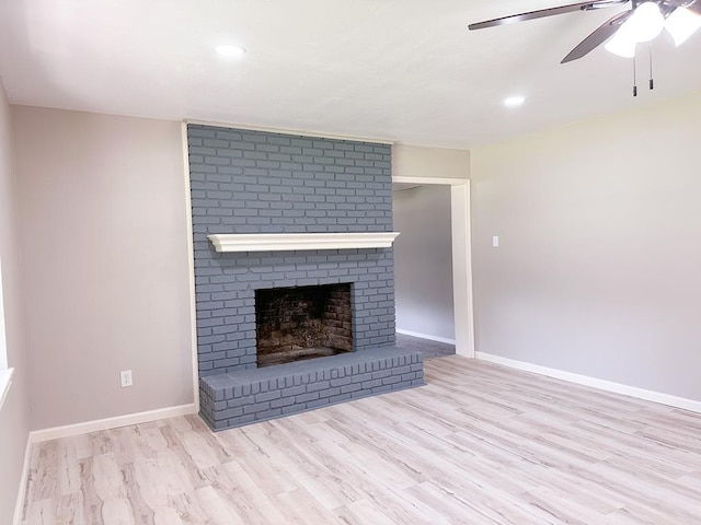 213 Crosstimbers St, Lufkin, TX 75904 - unfurnished living room with a ceiling fan, a fireplace, wood finished floors, baseboards, and recessed lighting