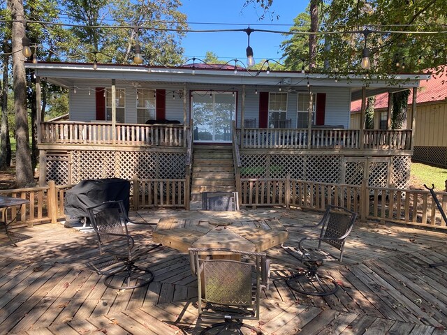 view of front of home with a deck