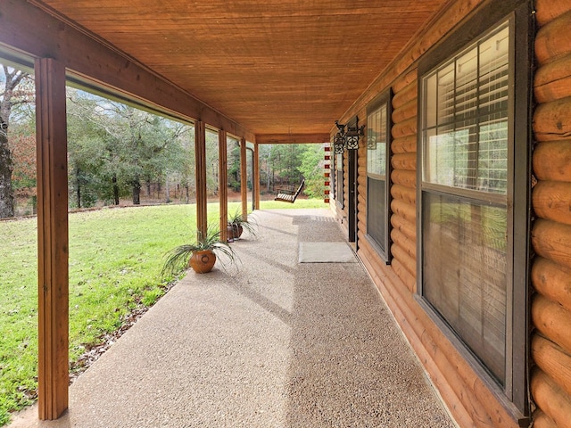 view of patio featuring a porch