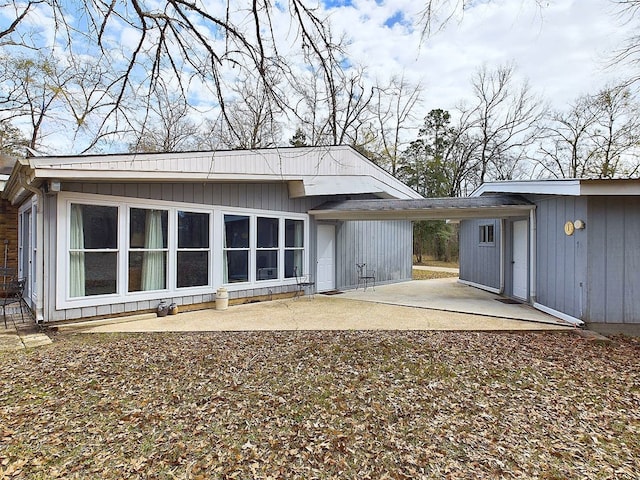 back of property featuring a patio area