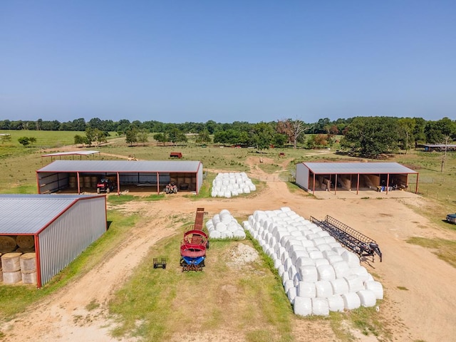 birds eye view of property featuring a rural view